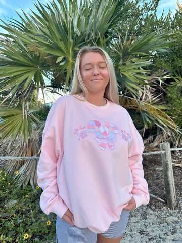 Cozy Light Pink Sweatshirt with Candy Cane Wonderland Print