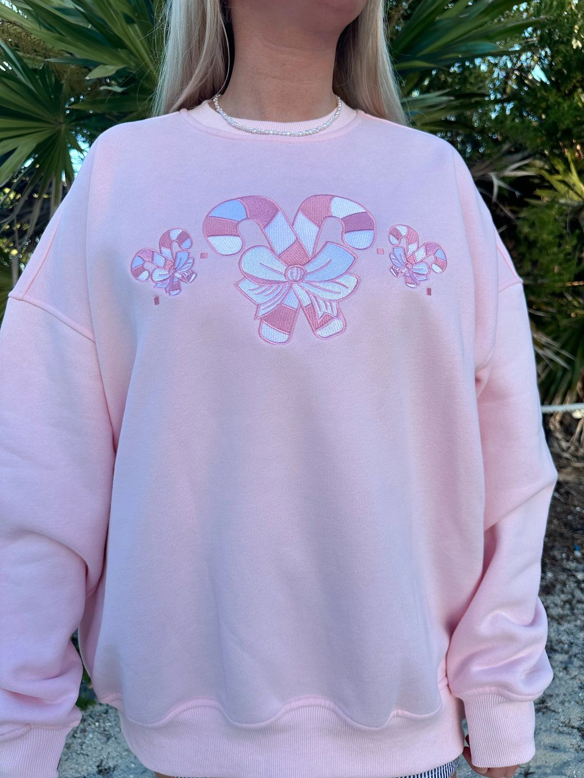 Cozy Light Pink Sweatshirt with Candy Cane Wonderland Print