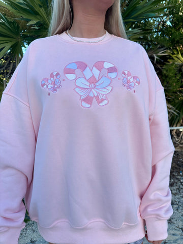 Cozy Light Pink Sweatshirt with Candy Cane Wonderland Print