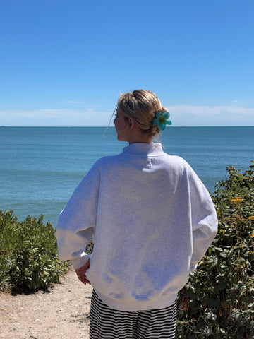 Pearl Grey Mockneck Sweatshirt with Embroidered Varsity Style