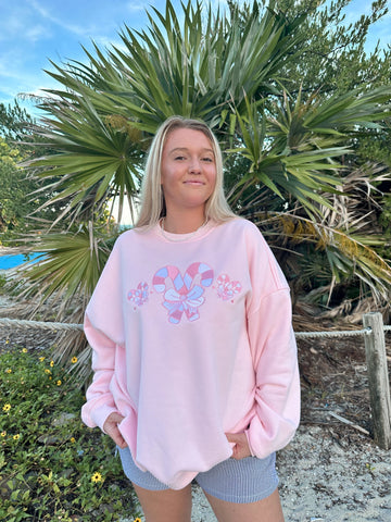 Cozy Light Pink Sweatshirt with Candy Cane Wonderland Print