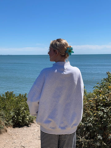 Pearl Grey Mockneck Sweatshirt with Embroidered Varsity Style