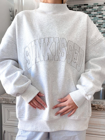 Pearl Grey Mockneck Sweatshirt with Embroidered Varsity Style
