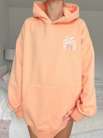 Vibrant Sherbet Orange Hoodie with Tropical Palms Print