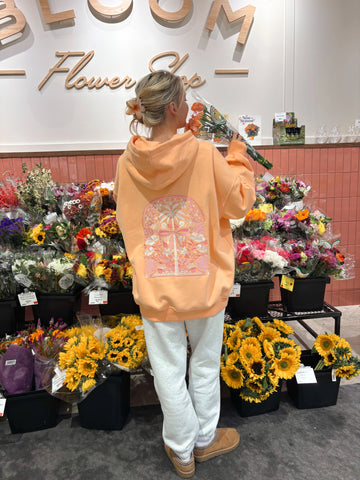 Vibrant Sherbet Orange Hoodie with Tropical Palms Print