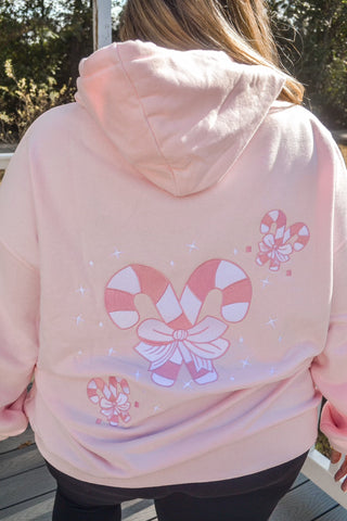 Cozy Pink Candy Cane Hoodie for Festive Street Style