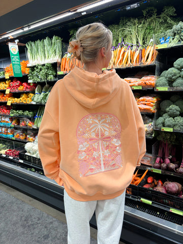 Vibrant Sherbet Orange Hoodie with Tropical Palms Print
