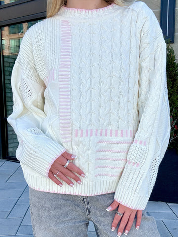 Cozy Patchwork Knit Sweater with Pink Stitching for Everyday Charm