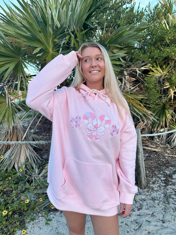 Cozy Pink Candy Cane Hoodie for Festive Street Style