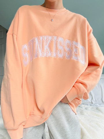 Varsity Embroidered Sweatshirt in Sherbet Orange for Effortless Street Style
