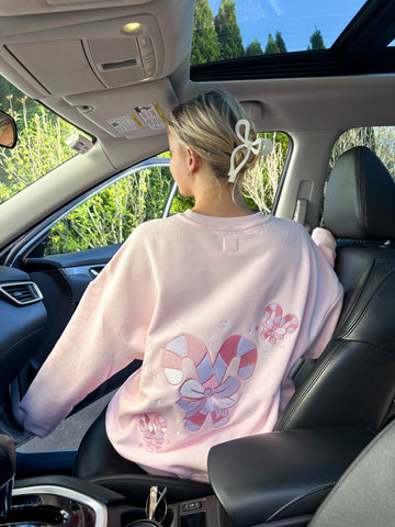 Cozy Light Pink Sweatshirt with Candy Cane Wonderland Print