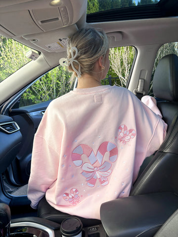 Cozy Light Pink Sweatshirt with Candy Cane Wonderland Print