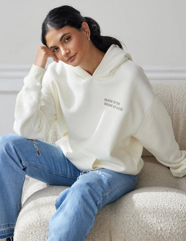 Cozy Cream Hoodie with Inspirational Bible Verse Genesis 1:27