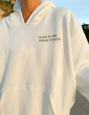 Cozy Cream Hoodie with Inspirational Bible Verse Genesis 1:27