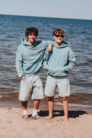 Ocean-Inspired Hoodie with Embroidered Shells for Coastal Style